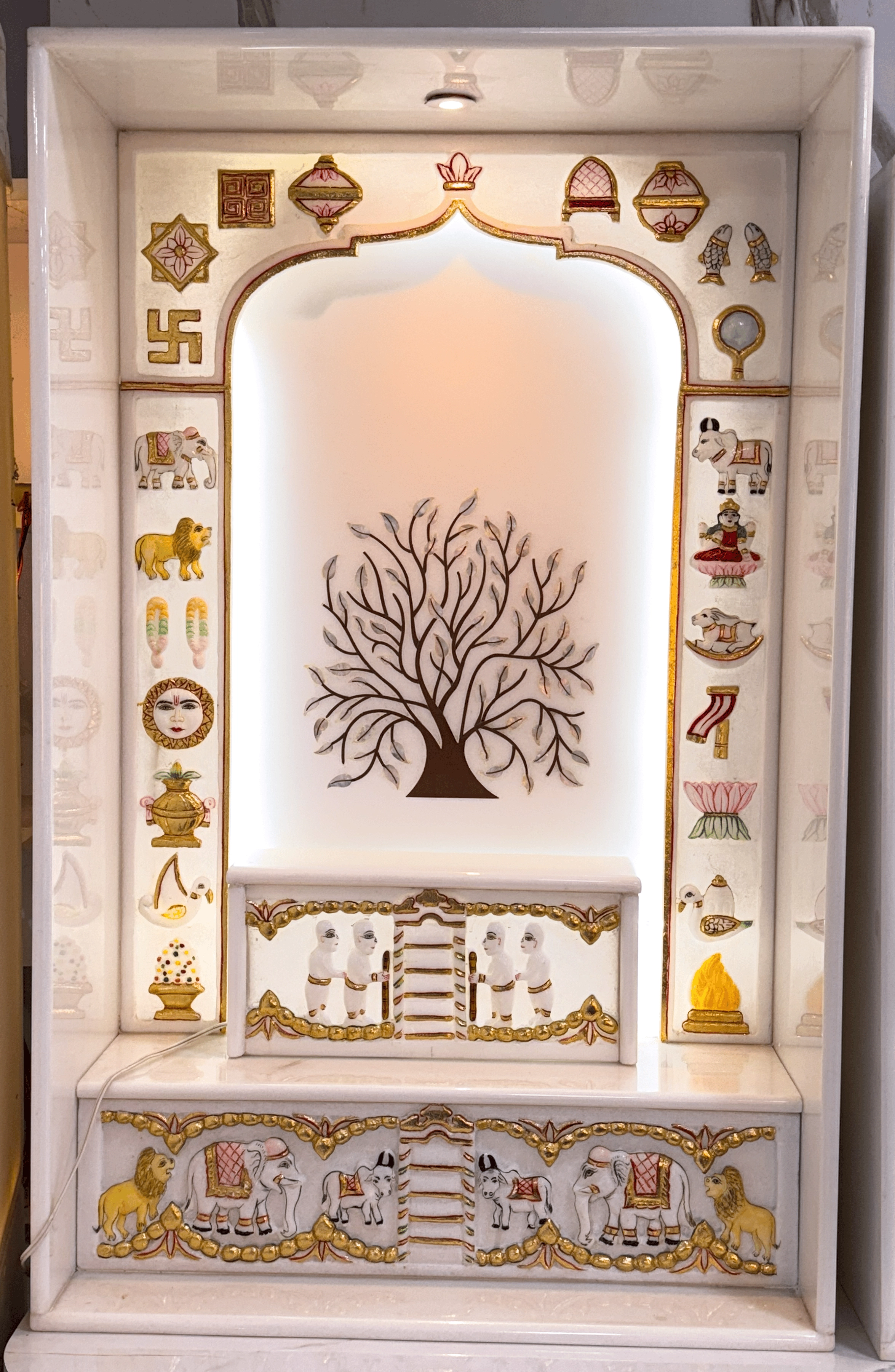 Minimalist Jain mandir with fine hand-carved details