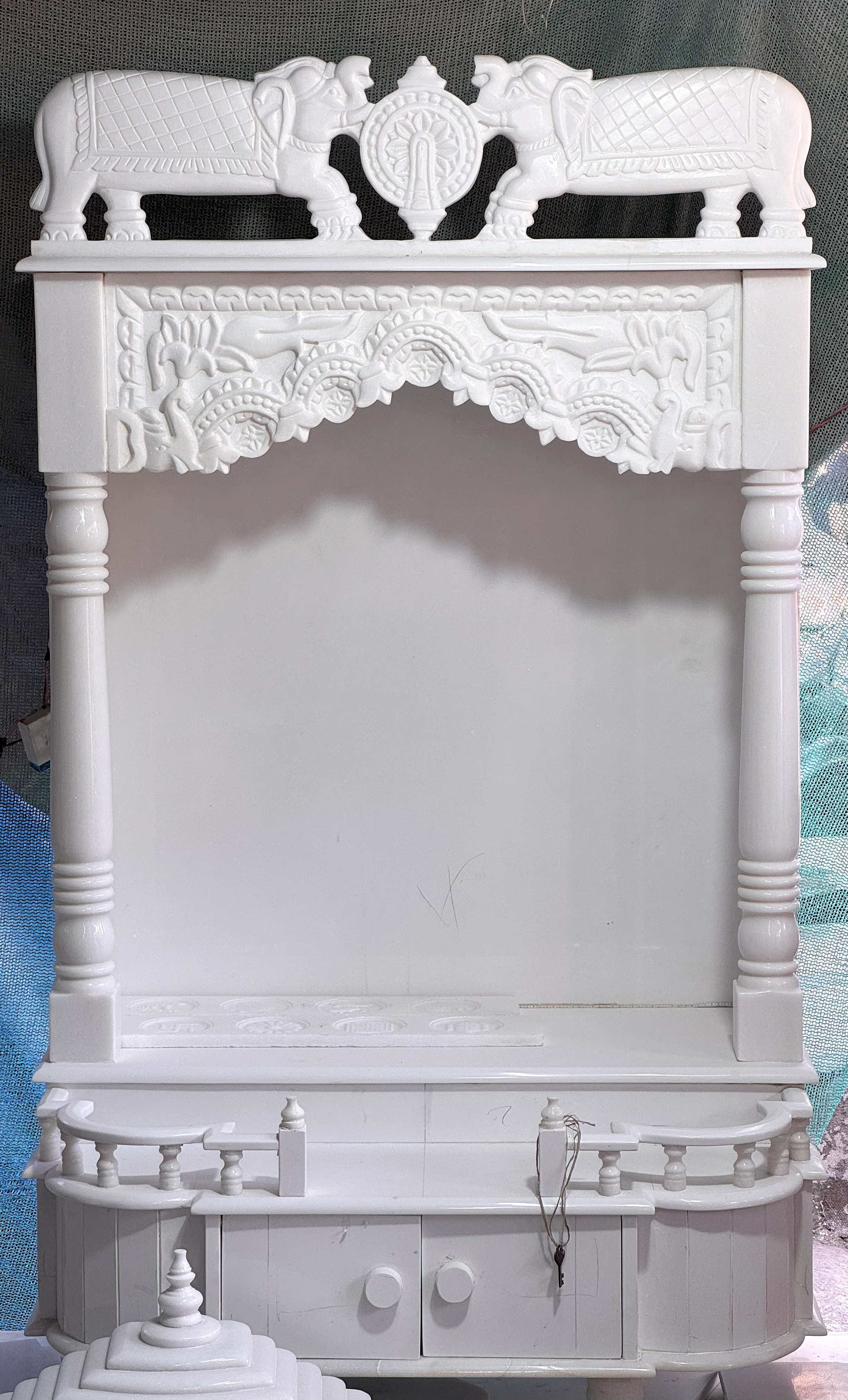 Only white marble mandir with intricate carvings and hathi ghumat