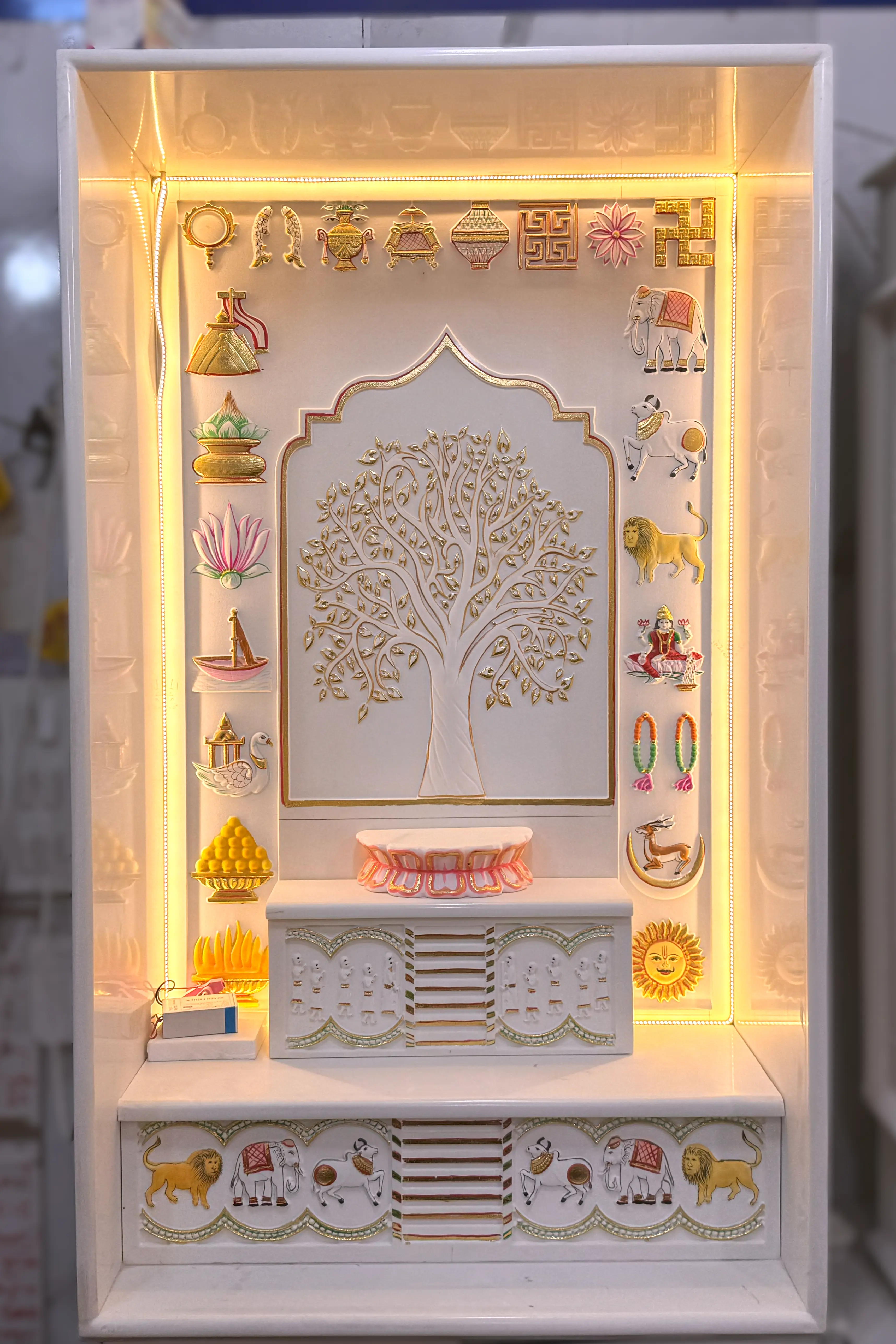 Traditional Jain marble designs with symbolic patterns and religious motifs